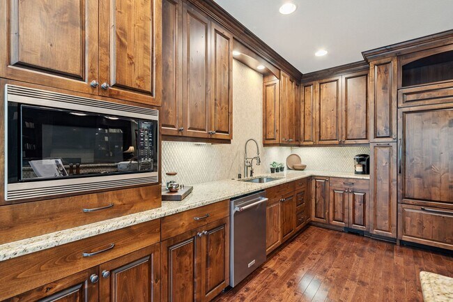 Building Photo - 2 Creeks Condominiums - Gated Community on...