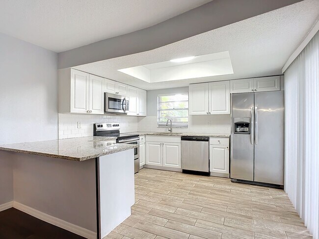 Building Photo - Coastal Charm Meets Modern Living: Your Dream Townhome in Port Orange Awaits!