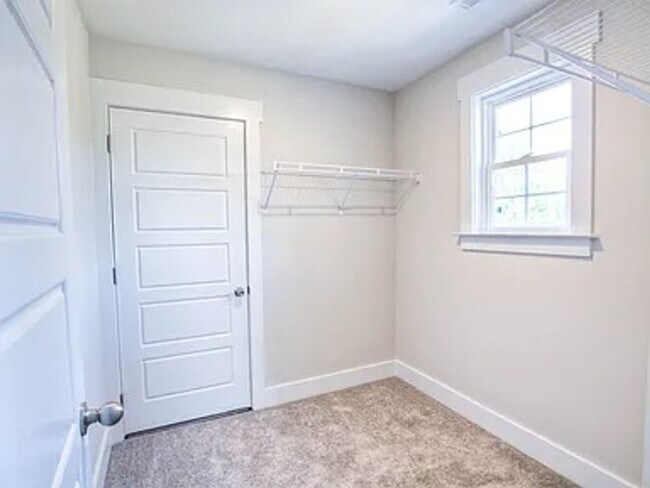 Building Photo - Situated on over 3 acres right in a growin...