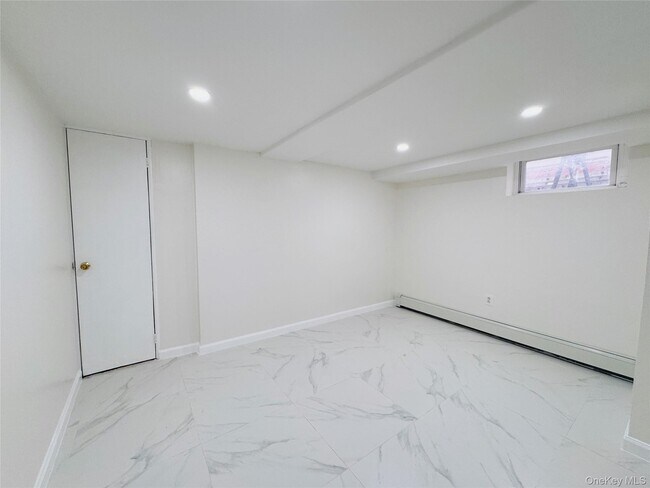 Building Photo - 117-01 14th Ave