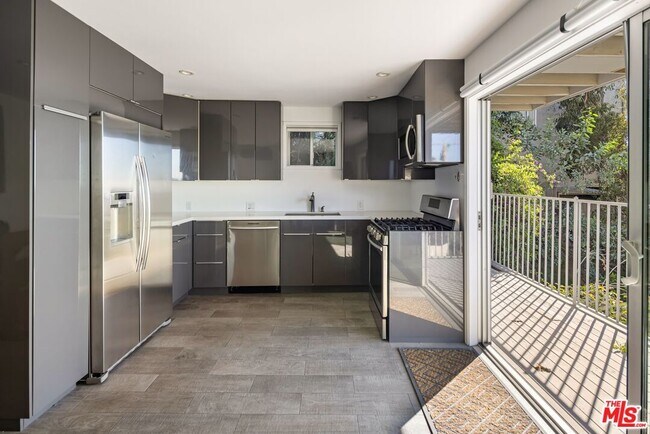 Building Photo - 8580 Hillside Ave