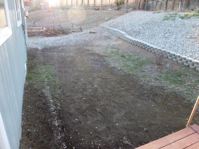 Building Photo - Four Bedroom, Two Bath, Two Car Garage Rem...