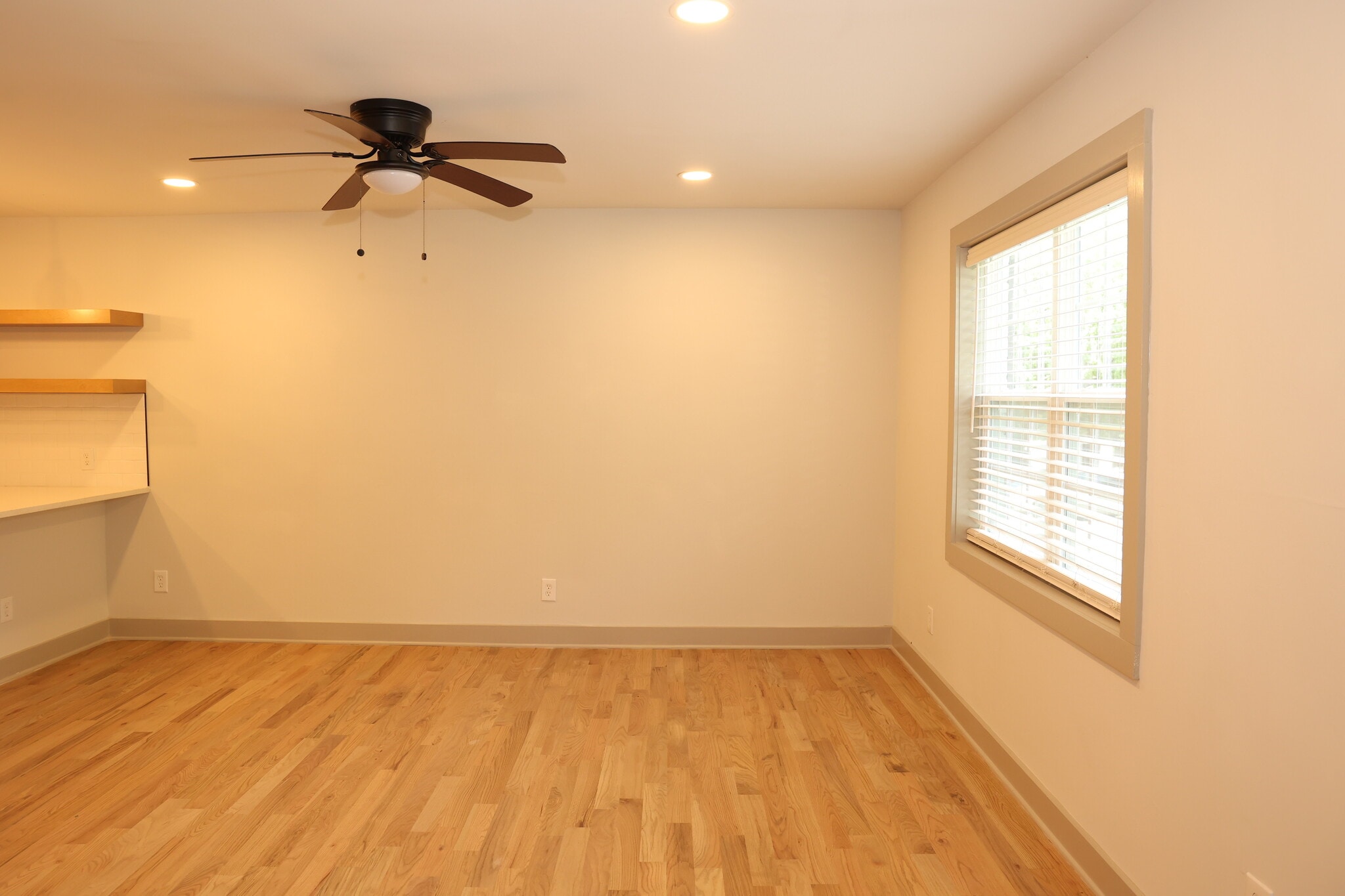 Well-lit living area with recessed lighting - 3170 Alston Townhomes.
