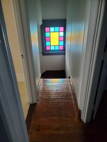 Top of stairs to 2nd floor - 507 W Mahoning St