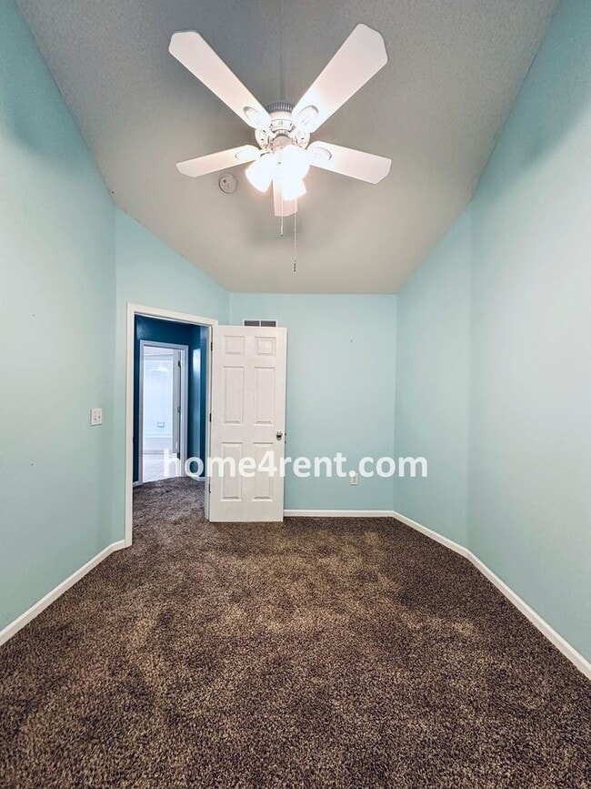 Building Photo - Blue Valley Schools w/ Wood Floors, Finished Basement and a Peaceful, Private Fenced Yard!