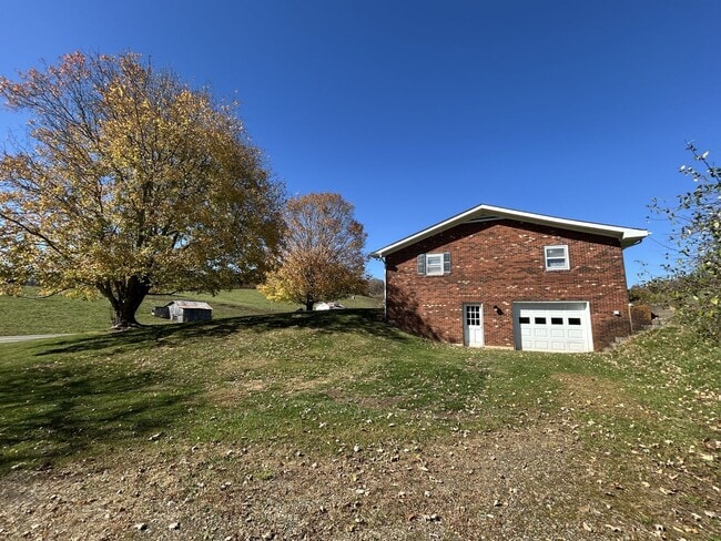 Building Photo - Large Brick Ranch with Finished Basement a...