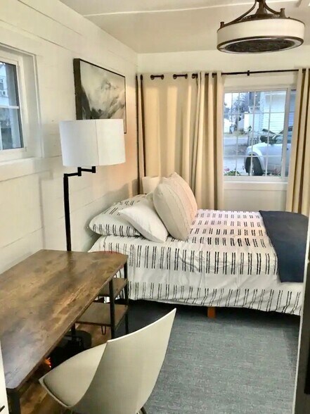 Bedroom with new queen bed with blackout curtains - 510 Auburndale Ave