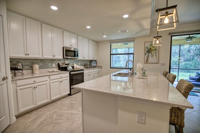 Building Photo - Seasonal Short-Term Coach Home 2-Bedrooms plus den, 2-Bath in Gran Paradiso!