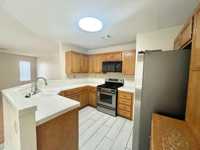 Building Photo - **$500 OFF MOVE IN BY 07/31/2026**Gorgeous 4 Bedroom Home with Pool & Spa Located in The Lakes
