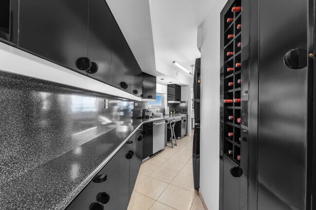 Building Photo - 4925 Collins Ave