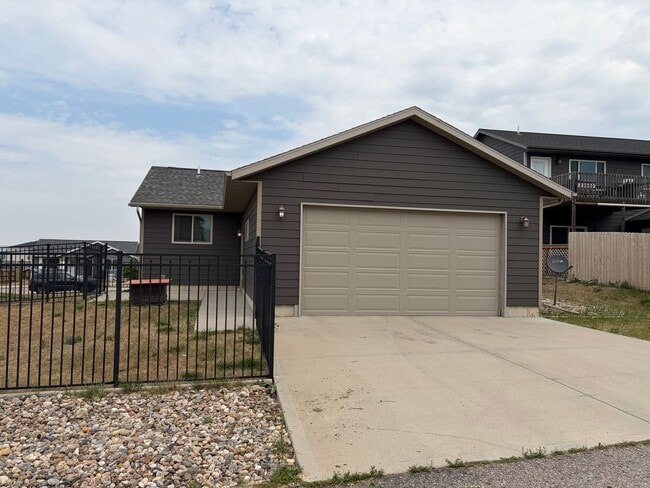 Building Photo - Modern 3-Bedroom Gem with Spacious Basement and Fenced Yard in Box Elder
