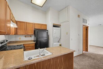 Building Photo - Charming Top-Floor Studio in Aurora with Private Patio & In-Unit Laundry