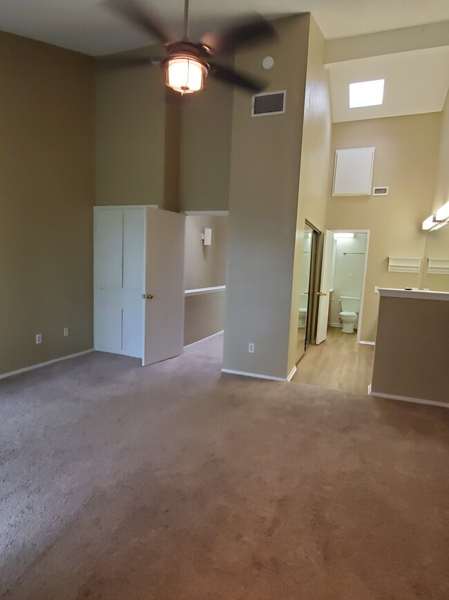 Spacious Master bedroom with high ceiling. - 7122 Wood Hollow Dr