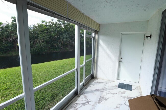 Building Photo - 6570 Royal Palm Blvd