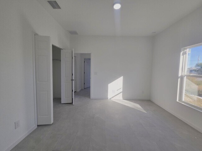 Building Photo - Brand New 2/2/1-PRIME SW LOCATION - Lehigh Acres