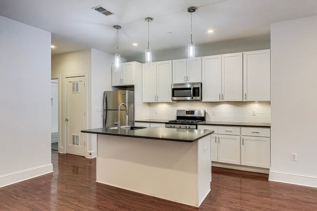 Building Photo - Welcome to Unit 202 at the Arboretum Condo...