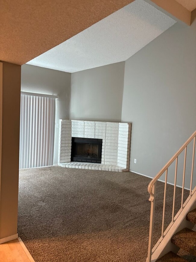 Building Photo - Updated Two Bedroom, 1.5 Bath Condo w/Fire...