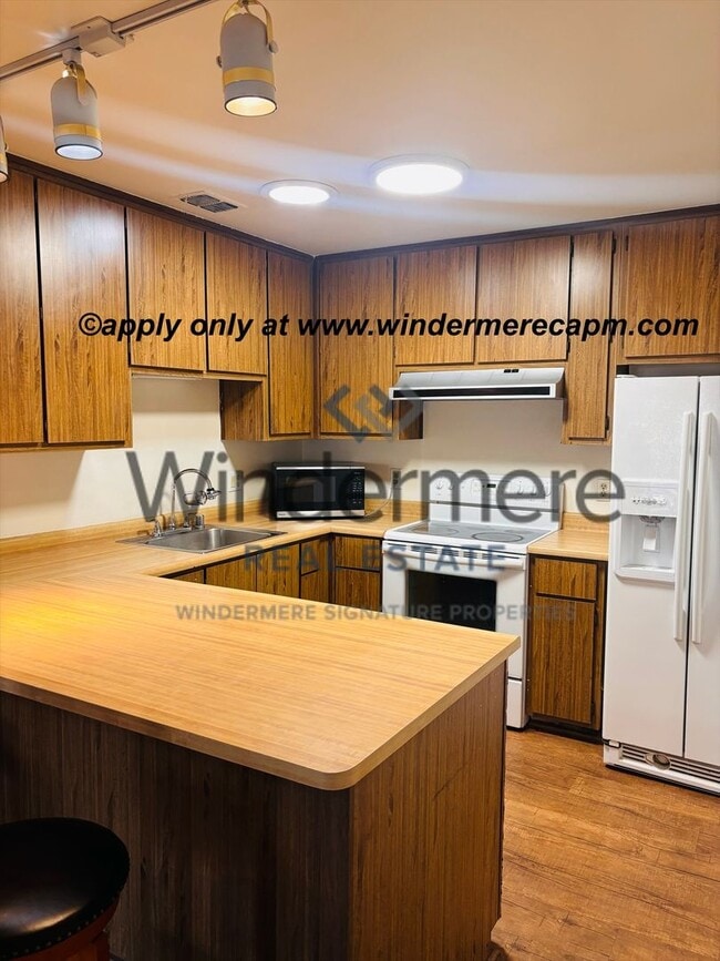 Building Photo - Available NOW! Charming 2-bedroom, 2-bath Home with BIG Solar savings and Swim Spa!