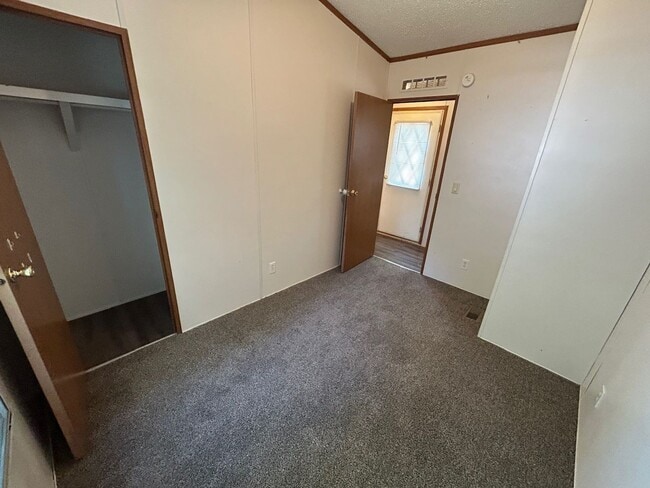 Building Photo - 3 Bed 2 Bath Mobile Home with Fenced Yard and Storage Shed