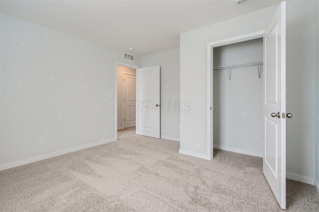 Building Photo - 6371 Marinelli Dr N