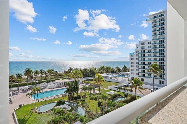 Building Photo - 5005 Collins Ave