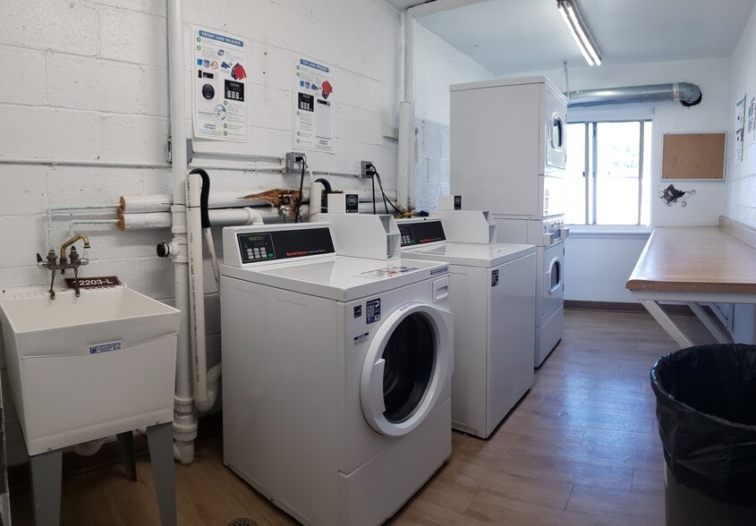 Laundry room in Building - 12203 Braxfield Ct