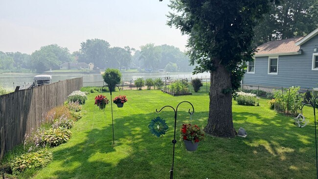 Building Photo - Riverfront Living on the Fox: 2 Bed, 1 Bath with Private Dock and Oversized Garage