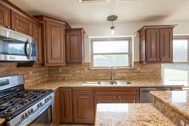 Building Photo - 8204 Tavaros Dr