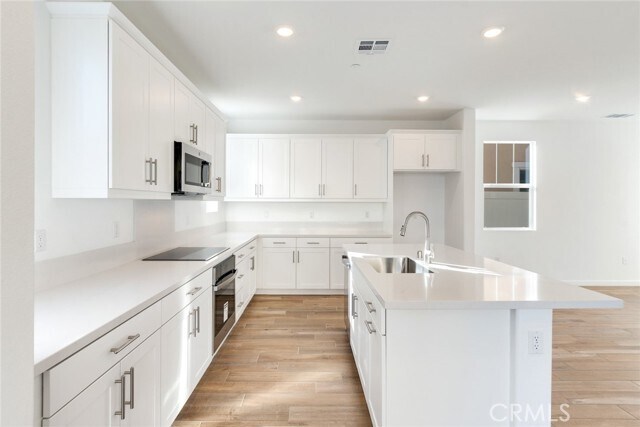 Building Photo - 10865 Pala Bells St