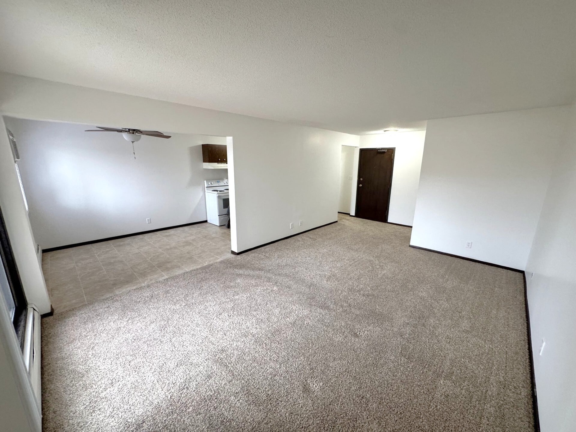 1 Bd- Living Room/Dinning Room Area - Fairway Woods Apartments
