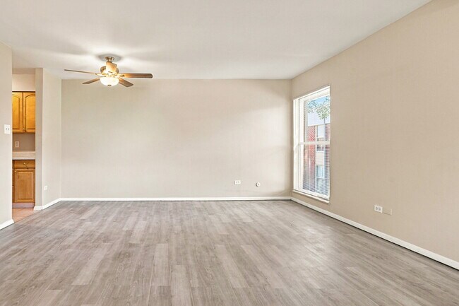 Building Photo - $1,445.95 with $300 Off The First Month's Rent, 2 Beds - 1 Bath, Condo in Denver with Central A/C!