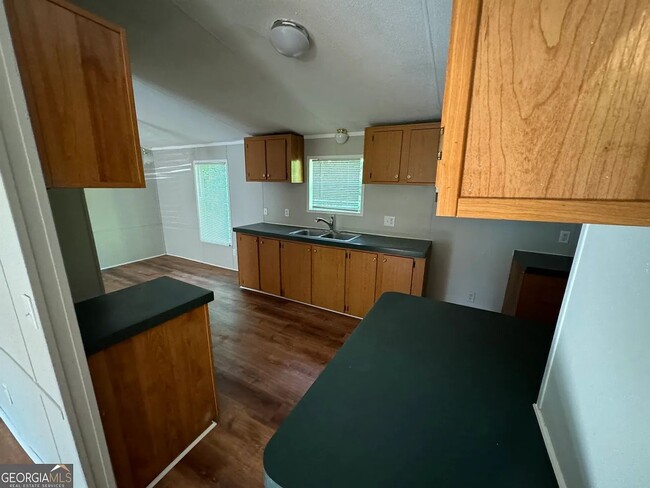 Building Photo - Rent Reduced!