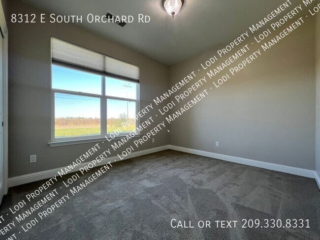 Building Photo - 8312 E Orchard Rd