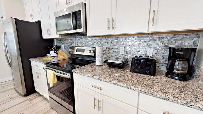 Building Photo - 3083 Tom Sawyer Dr