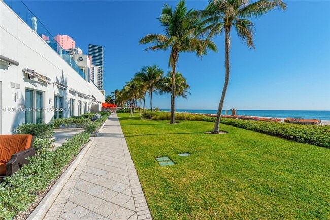 Building Photo - 19111 Collins Ave