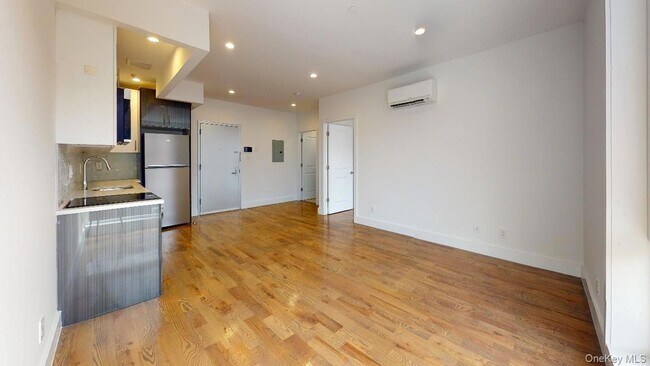 Building Photo - 138-28 Queens Blvd