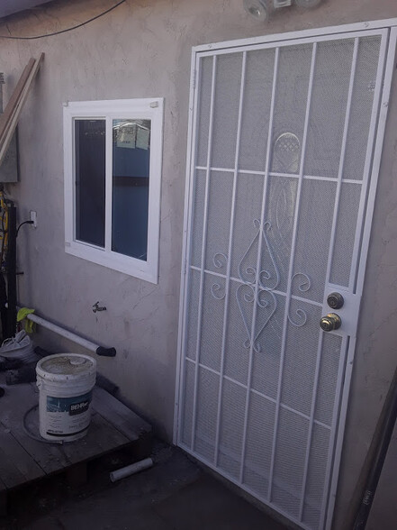 FRONT DOOR SECURITY SCREEN - 25223 Western Ave