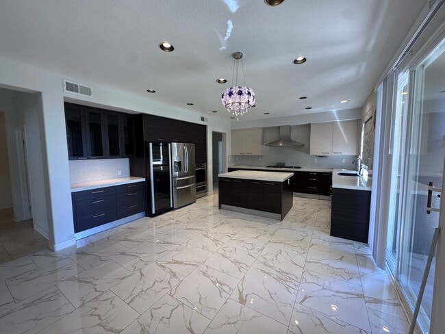 Building Photo - Stunning Home with Panoramic Views in Port...