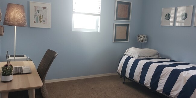 3rd bedroom upstairs, next to laundry room - 1465 W Flamingo Dr