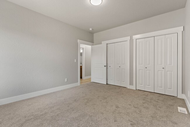 Building Photo - Newly Built 4 Bedroom Duplex With Yard