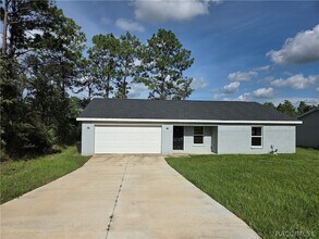 Building Photo - 7061 N Outrigger Terrace
