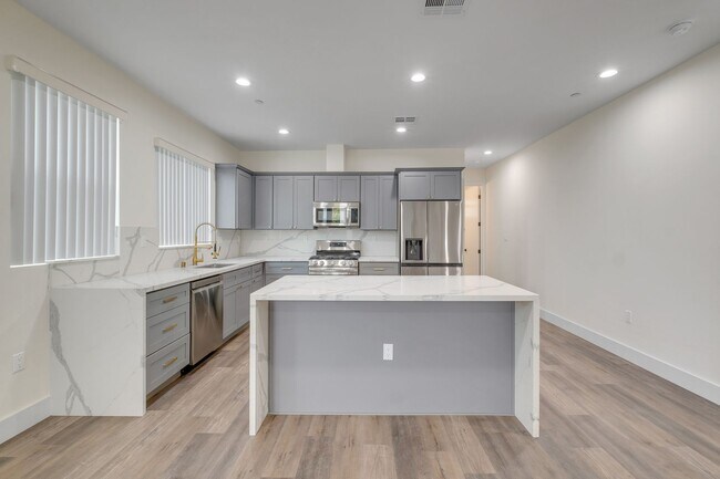 Building Photo - A beautifully designed and renovated 4 bed...