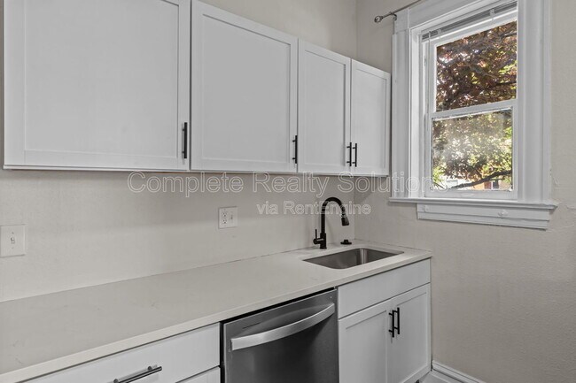 Building Photo - 3402 Dunnica Ave
