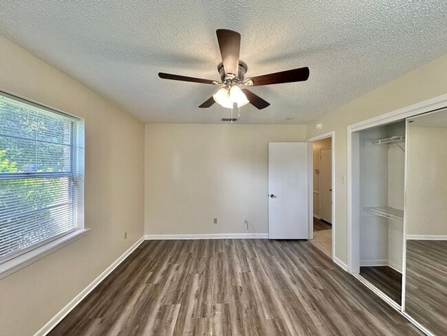 Building Photo - Spacious 4-Bedroom Home on a Corner Lot wi...