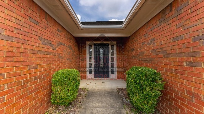 Building Photo - 8031 Garrett Pines Dr