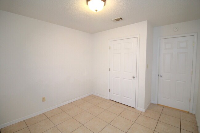 Building Photo - Spacious Vinyl-Sided 2BR Apartment with Open Layout, Private Patio, and Pet-Friendly Options – Av...