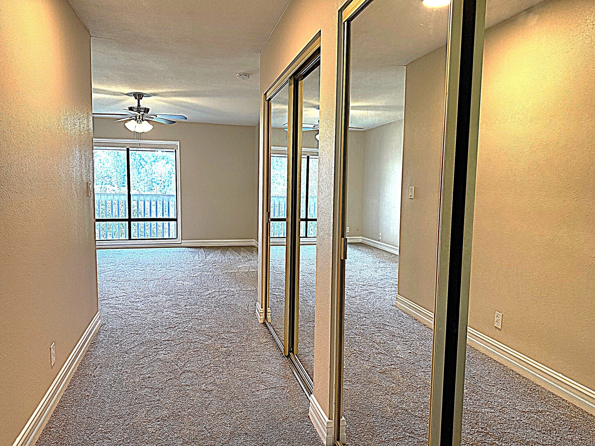 Wall of closet space from primary bedroom - 545 S Ranch View Cir