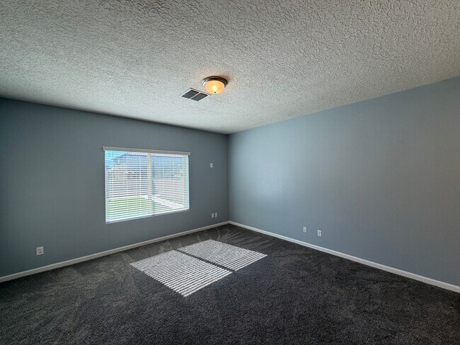 Building Photo - 4 Bedroom + Office Home Available Near Loma Colorado Blvd NE & Broadmoor Blvd NE in Rio Rancho!
