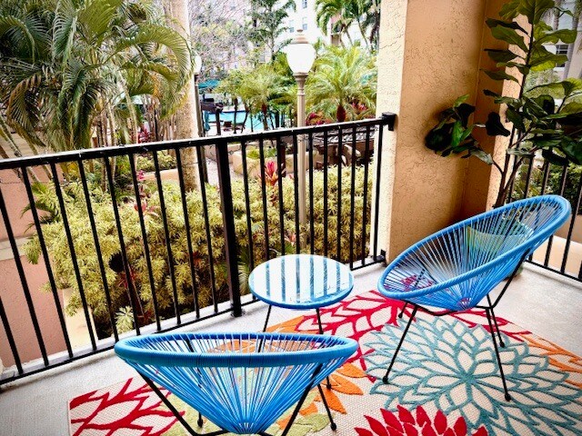 Balcony overlooking pool - 520 SE 5th Ave