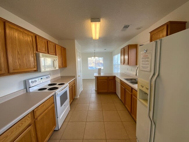 Building Photo - 3 Bedroom Single Story Home Available in Ventana Ranch Near Irving Blvd NW & Universe Blvd NW!